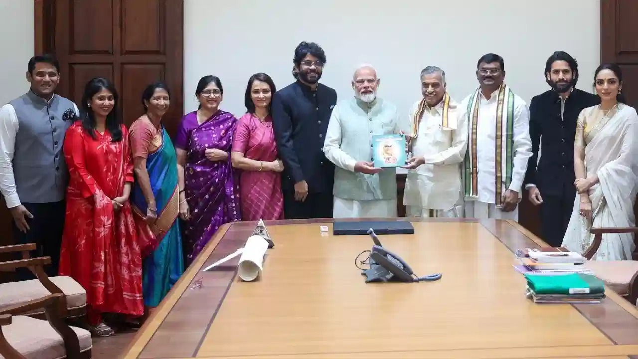 nagarjuna family gifts pm modi with book on nageswara rao